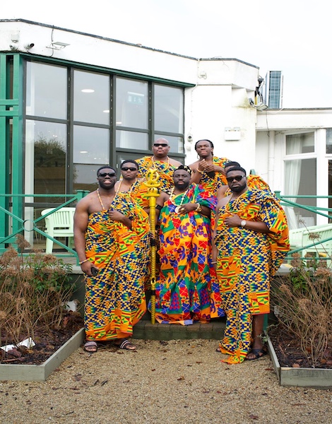 A group dressed in colourful traditional Ghanaian clothing
